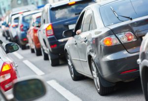 Cars stuck in traffic on city street