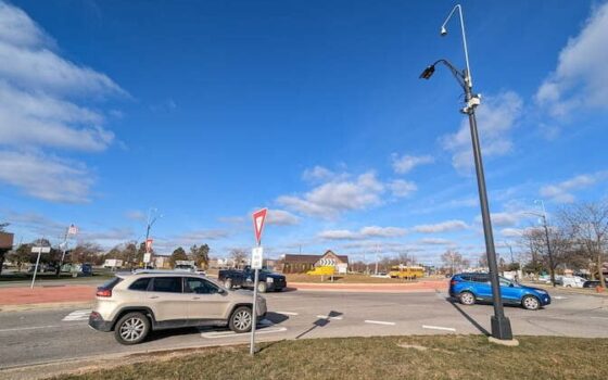 Vehicle enters a two-lane roundabout