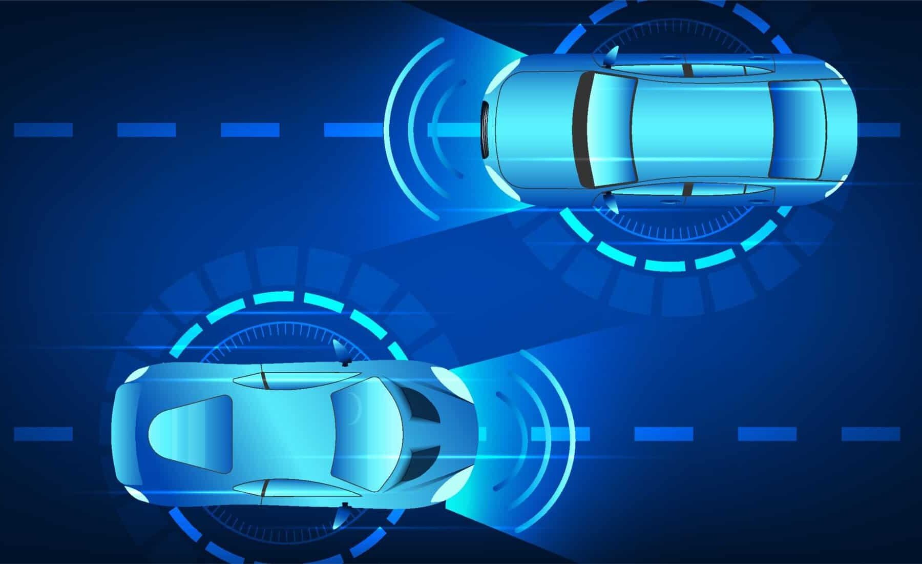 Aerial view of two autonomous vehicles driving past each other
