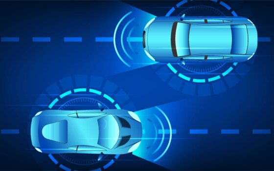 Aerial view of two autonomous vehicles driving past each other