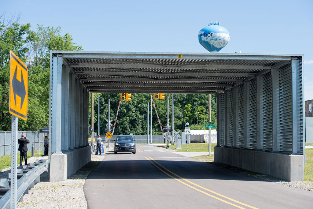 A highway overpass is simulated at the Mcity Test Facility by a tunnel that blocks vehicles from wireless and satellite signals.